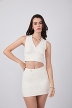 FALDA SHORT CON HEBILLAS Y CIERRE POSTERIOR PERLA - MERCY