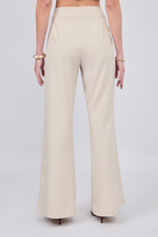 PANTALÓN FLARE SASTRE CON BOLSILLOS A LOS LATERALES BEIGE - ENROQUE