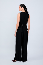 PANTALÓN SASTRERO CON LAZO Y PLIEGUES DELANTEROS NEGRO- MELISSA