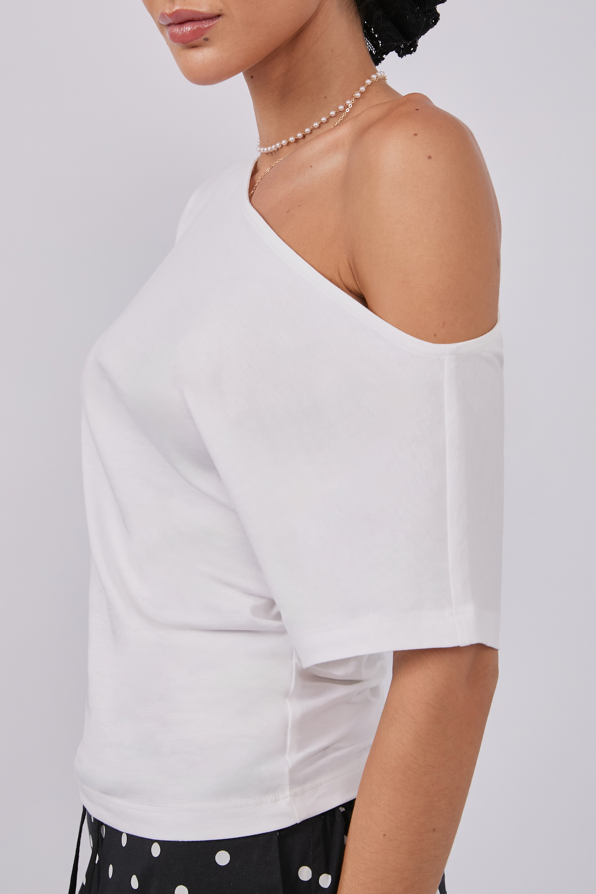 TOP ASIMÉTRICO DE ALGODÓN PIMA PERLA  - MAGDA