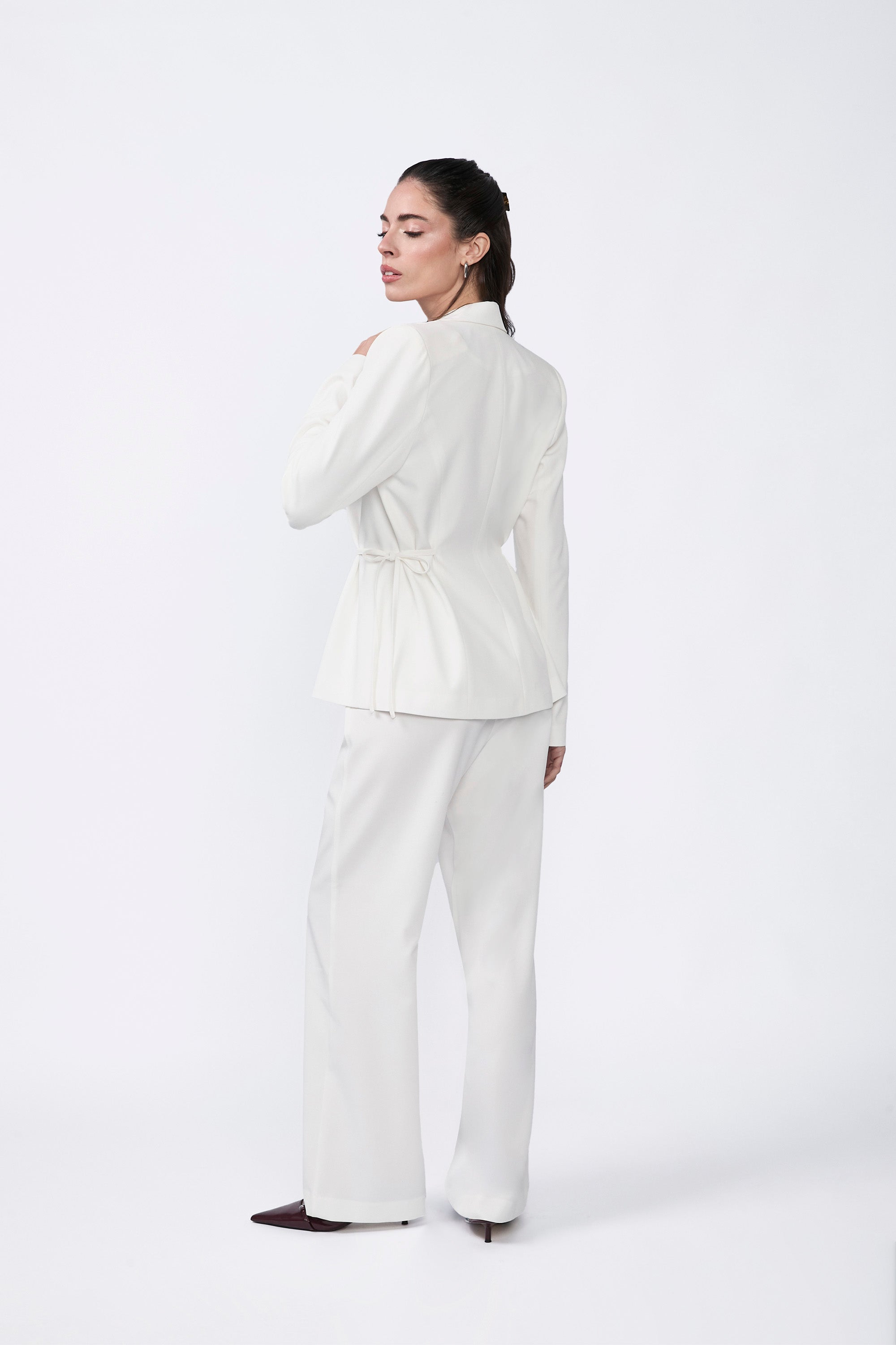 Sienna blazer with lapel and pearl waist tie.