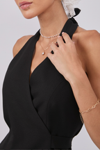 CHALECO ESCOTE EN V CON REGULADOR NEGRO - MISHKY